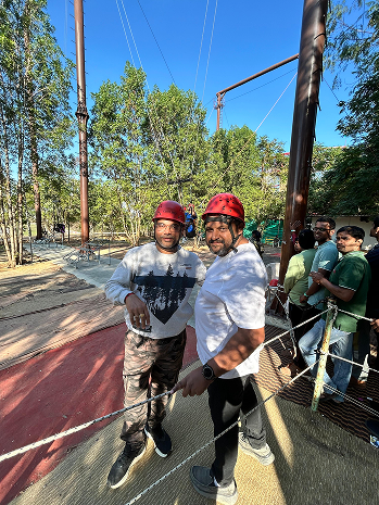 Managers participating in outdoor team building activity
